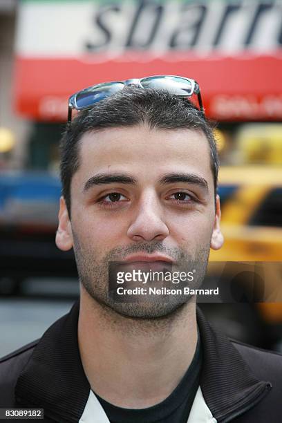 Actor Oscar Isaac unveils a new interactive Virtual Town Hall Billboard for "An Obama Minute" to help raise $1 Million in one minute in Times Square...