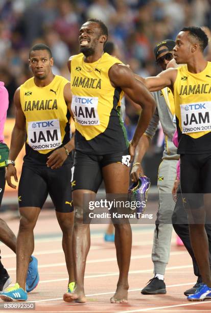 Usain Bolt of Jamaica pulls up during the Men's 4x100m Relay final during day nine of the 16th IAAF World Athletics Championships at the London...