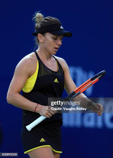 Simona Halep of Romania reacts after a missed shot against Elina Svitolina of Ukraine during a semifinal match on Day 8 of the Rogers Cup at Aviva...