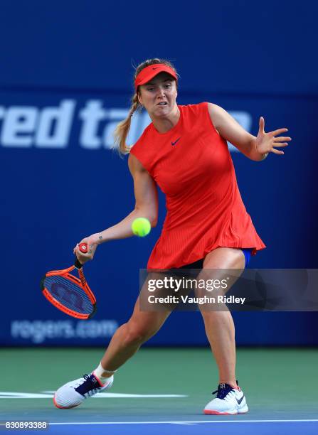 Elina Svitolina of Ukraine plays a shot against Simona Halep of Romania during a semifinal match on Day 8 of the Rogers Cup at Aviva Centre on August...