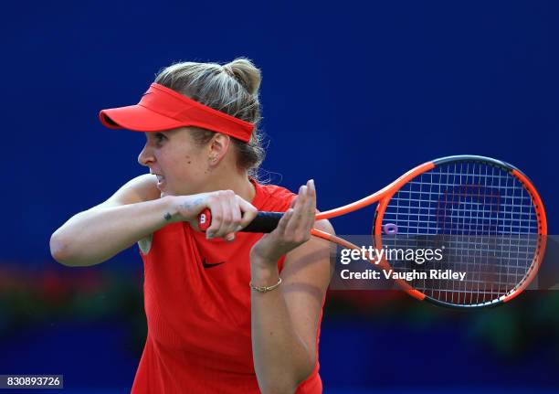 Elina Svitolina of Ukraine plays a shot against Simona Halep of Romania during a semifinal match on Day 8 of the Rogers Cup at Aviva Centre on August...