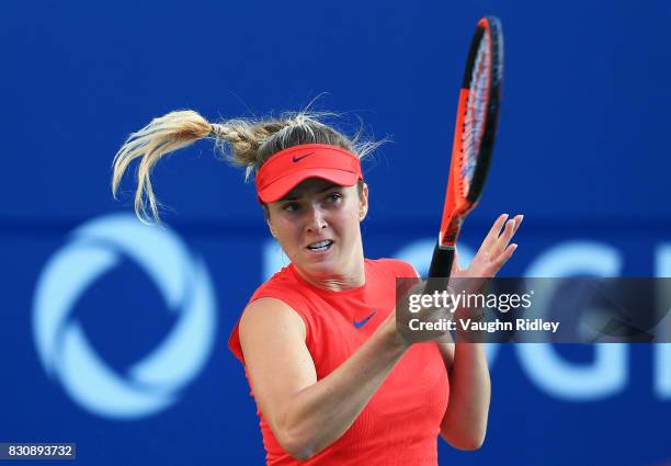 Elina Svitolina of Ukraine plays a shot against Simona Halep of Romania during a semifinal match on Day 8 of the Rogers Cup at Aviva Centre on August...