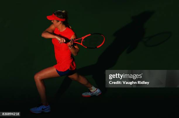 Elina Svitolina of Ukraine plays a shot against Simona Halep of Romania during a semifinal match on Day 8 of the Rogers Cup at Aviva Centre on August...