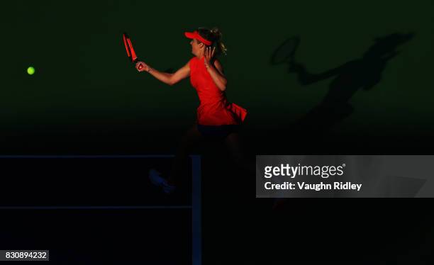 Elina Svitolina of Ukraine plays a shot against Simona Halep of Romania during a semifinal match on Day 8 of the Rogers Cup at Aviva Centre on August...