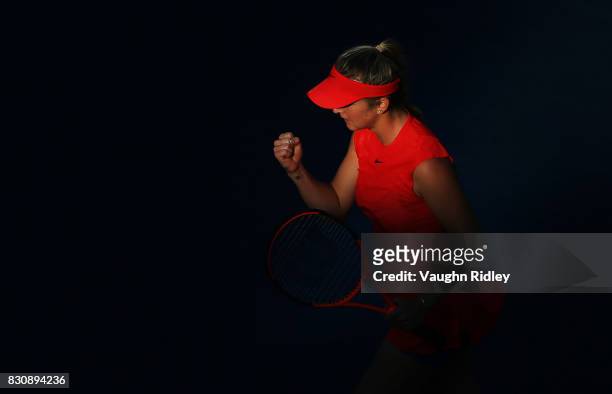 Elina Svitolina of Ukraine celebrates winning a game against Simona Halep of Romania during a semifinal match on Day 8 of the Rogers Cup at Aviva...