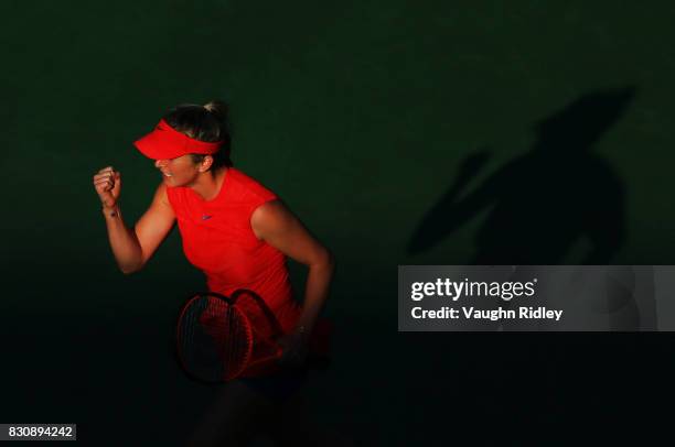 Elina Svitolina of Ukraine celebrates winning a game against Simona Halep of Romania during a semifinal match on Day 8 of the Rogers Cup at Aviva...