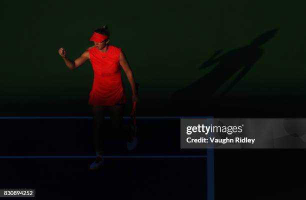 Elina Svitolina of Ukraine celebrates winning a game against Simona Halep of Romania during a semifinal match on Day 8 of the Rogers Cup at Aviva...