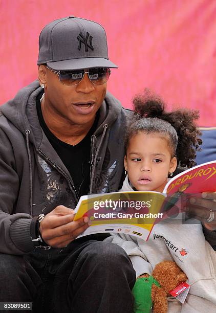 Actor/musician LL Cool J reads to 4 year old Tyjahay Muhammed and children attending Jumpstart's Read for the Record at The Today Show on October 2,...