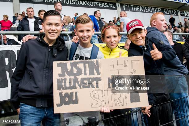 Fans with a sign for Justin Kluivert of Ajax during the Dutch Eredivisie match between Heracles Almelo and Ajax Amsterdam at Polman stadium on August...