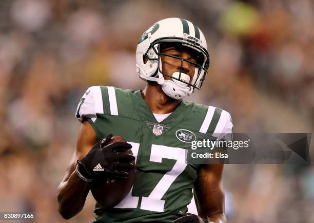 Charone Peake of the New York Jets celebrates his touchdown in the first quarter against the Tennessee Titans during a preseason game at MetLife...