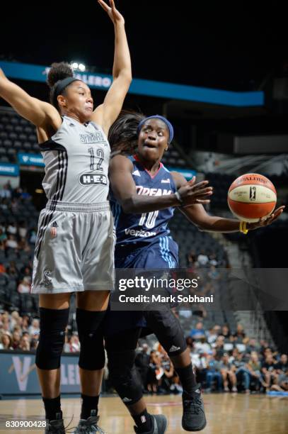 Matee Ajavon of the Atlanta Dream goes for a lay up against Nia Coffey of the San Antonio Stars on August 12, 2017 at the AT&T Center in San Antonio,...