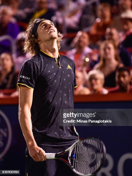 Alexander Zverev of Germany looks up at the sky after winning 6-4, 7-5 over Denis Shapovalov of Canada during day nine of the Rogers Cup presented by...