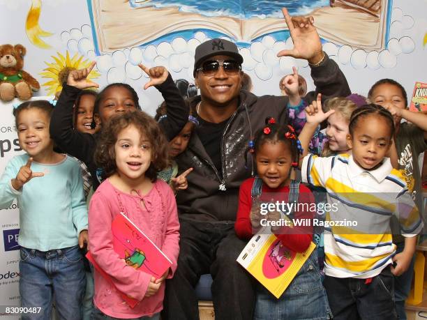 Actor/musician LL Cool J poses with Jumpstart students during Jumpstart's Read for the Record Day at Bank Street Head Start Center on October 2, 2008...