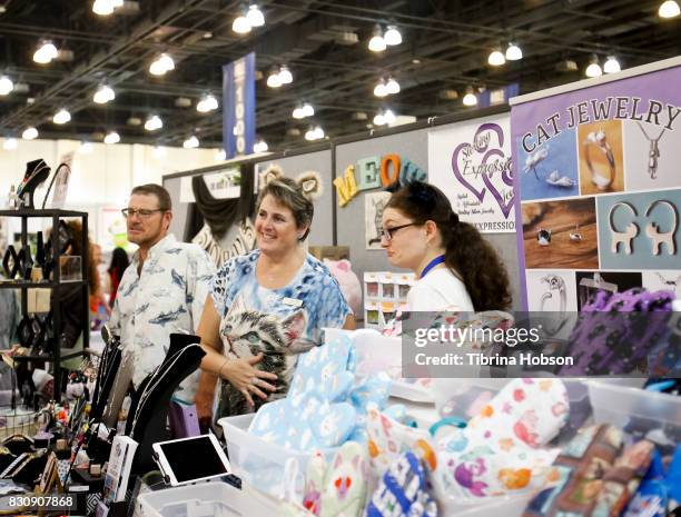 Cat enthusiast attend the 3rd Annual CatCon at Pasadena Convention Center on August 12, 2017 in Pasadena, California.