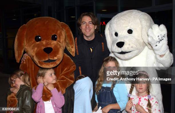 Presenter Jonathan Ross and his children arriving at the Warner Village Cinema, Islington, north London for the UK gala screening of Scooby Doo.