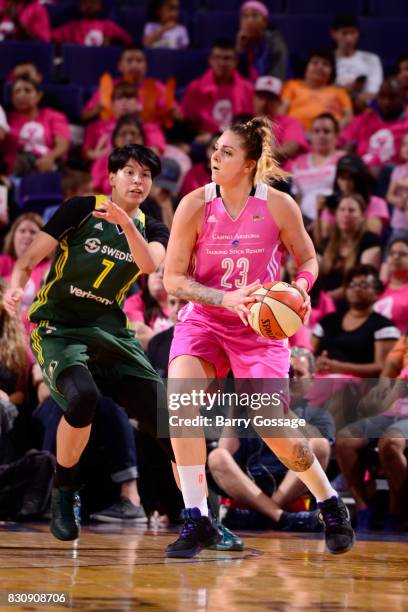 Cayla George of the Phoenix Mercury handles the ball against Ramu Tokashiki of the Seattle Storm on August 12, 2017 at Talking Stick Resort Arena in...