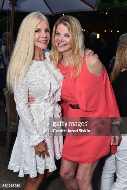 Nancy Pearson and Gwendolyn Beck attend AVENUE on the Beach's Summer Soiree at The Baker House on August 12, 2017 in East Hampton, New York.
