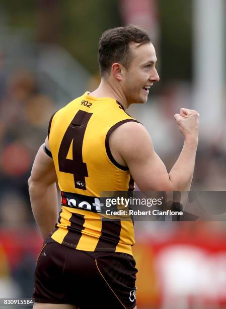 Billy Hartung of the Hawks celebrates after scoring a goal during the round 21 AFL match between the Hawthorn Hawks and the North Melbourne Kangaroos...