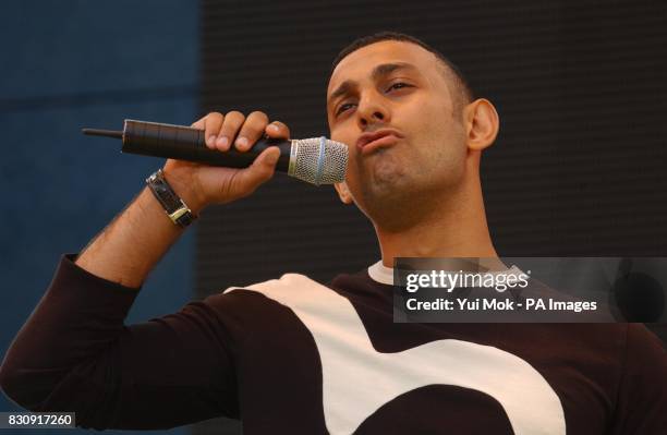 Boxer Prince Naseem Hamed on stage during the 95.8 Capital Radio Party in the Park, in Hyde Park, London in aid of The Prince's Trust.