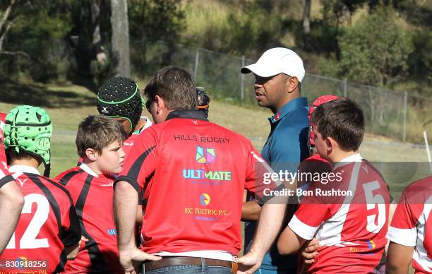 Kurtley Beale with junior teams during an Australian Wallabies fan day on August 13, 2017 in Penrith, Australia.