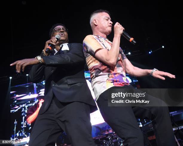 Christopher "Play" Martin and Christopher "Kid" Reid of Kid N Play perform during the KISS 104.1 Flashback Festival at Lakewood Amphitheatre on...