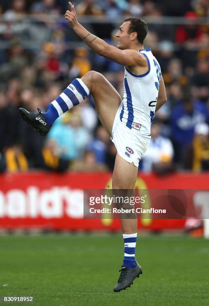 Braydon Preuss of the Kangaroos kicks on goal during the round 21 AFL match between the Hawthorn Hawks and the North Melbourne Kangaroos at...