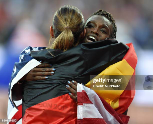 Bronze medal winner Pamela Dutkiewicz of Germany, and silver medal winner Dawn Harper Nelsonof USA, celebrating after the100 meter hurdles final in...