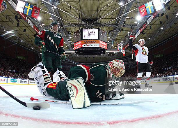 Jesse Winchester of the Ottawa Senators celebrates a goal as Ari Ahonen of the Frolunda Indians looks back into his net at Scandinavium Arena on...