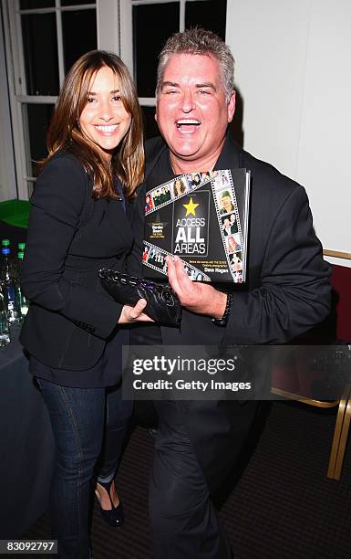 Celebrity Photographer Dave Hogan poses with Mel Blatt at the launch of his book Access All Areas on October 2, 2008 in London, England. Dave has...