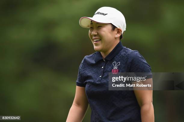 Jiyai Shin of South Korea reacts after her putt on the first green during the final round of the NEC Karuizawa 72 Golf Tournament 2017 at the...