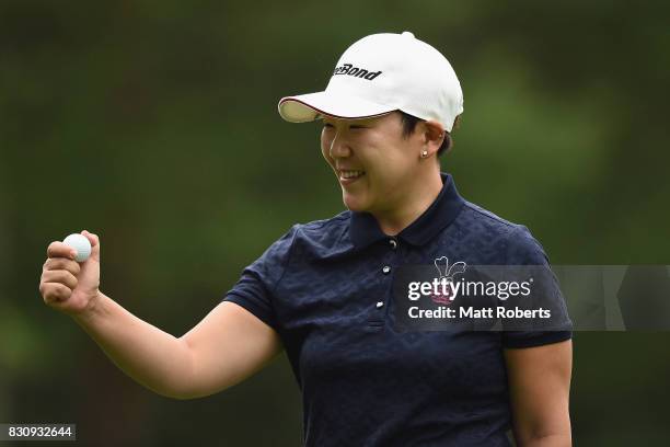 Jiyai Shin of South Korea reacts after her putt on the first green during the final round of the NEC Karuizawa 72 Golf Tournament 2017 at the...