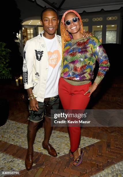 Pharrell Williams and Alicia Keys attend Apollo in the Hamptons 2017: hosted by Ronald O. Perelman at The Creeks on August 12, 2017 in East Hampton,...