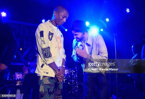 Pharrell Williams and Justin Timberlake perform onstage at Apollo in the Hamptons 2017: hosted by Ronald O. Perelman at The Creeks on August 12, 2017...