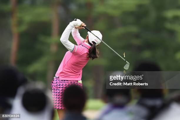 Rie Tsuji of Japan hits her tee shot on the 12th hole during the final round of the NEC Karuizawa 72 Golf Tournament 2017 at the Karuizawa 72 Golf...
