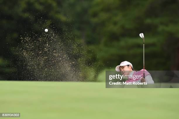 Rie Tsuji of Japan hits out of the 14th green bunker during the final round of the NEC Karuizawa 72 Golf Tournament 2017 at the Karuizawa 72 Golf...