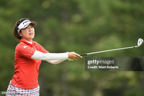 Shiho Oyama watches her second shot on the 14th hole during the final round of the NEC Karuizawa 72 Golf Tournament 2017 at the Karuizawa 72 Golf...