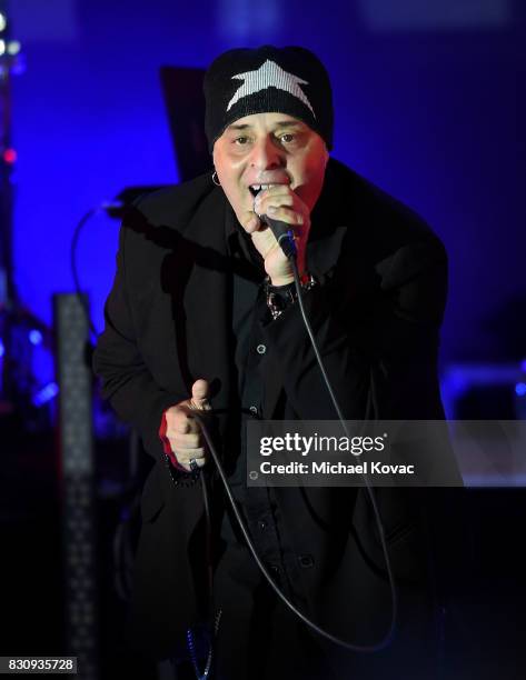 Singer Claude Strilio of the band Anything Box performs at The Starlight Bowl on August 12, 2017 in Burbank, California.