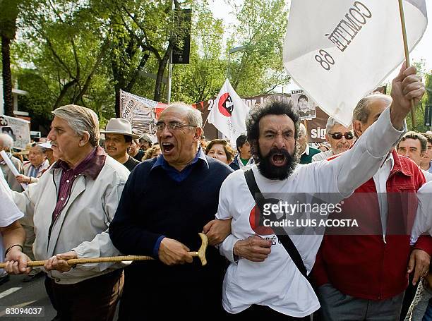Survivors of the student massacre of Tlatelolco, march during its 40th anniversary, in Mexico City, on October 2, 2008. Mexico commemorates the 40th...