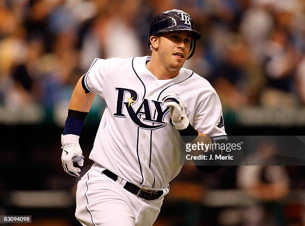 Third baseman Evan Longoria of the Tampa Bay Rays rounds the bases after his first home run against the Chicago White Sox in Game 1 of the American...