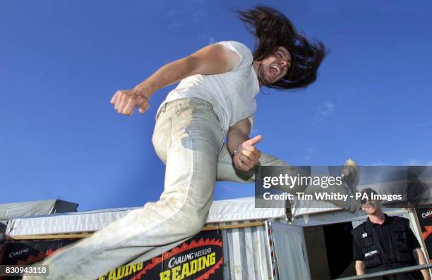 Andrew W K backstage before performing on the main stage at the Carling Weekend music festival in Reading, Saturday 24 August 2002. PA Photos by Tim...