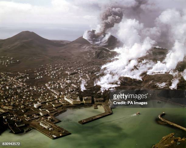 Black ashes cover the town of Vestmannaeyjar on the island Heimaey, Iceland, pictured several months after the volcano eruption in 1973. In the...
