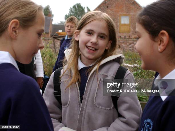 Abbey Cape returns to Snarestone Primary Schoo Ashby-de-la-Zouch, Leicestershire after receiving a heart transplant in April following three weeks on...