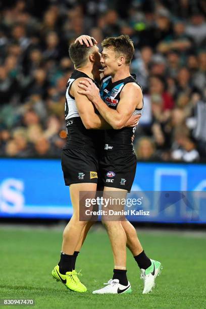 Sam Gray of the Power celebrates after kicking a goal with Robbie Gray of the Power during the round 21 AFL match between Port Adelaide Power and the...