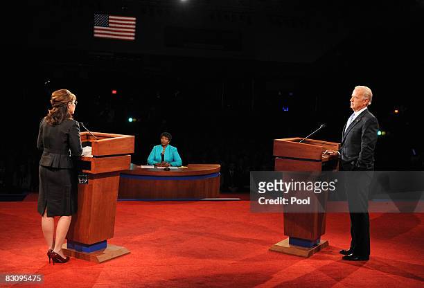 Journalist and debate moderator Gwen Ifill listens to Democratic vice presidential candidate U.S. Senator Joe Biden and Republican vice presidential...