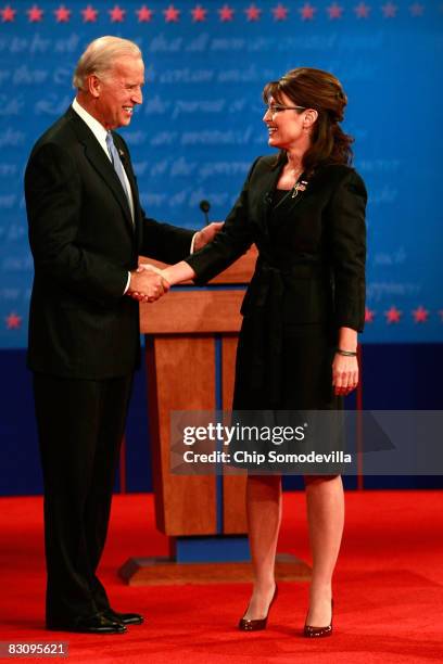 Democratic vice presidential candidate U.S. Senator Joe Biden shakes hands with Republican vice presidential candidate Alaska Gov. Sarah Palin after...