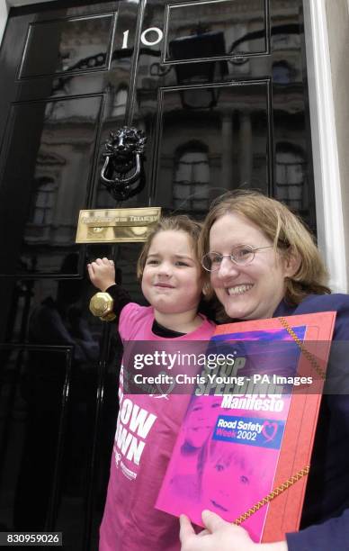 Sophie Graham from Newcastle knocks on the Prime Minister's door, 10 Downing Street, London, with Mary Williams from road safety group BRAKE. *...