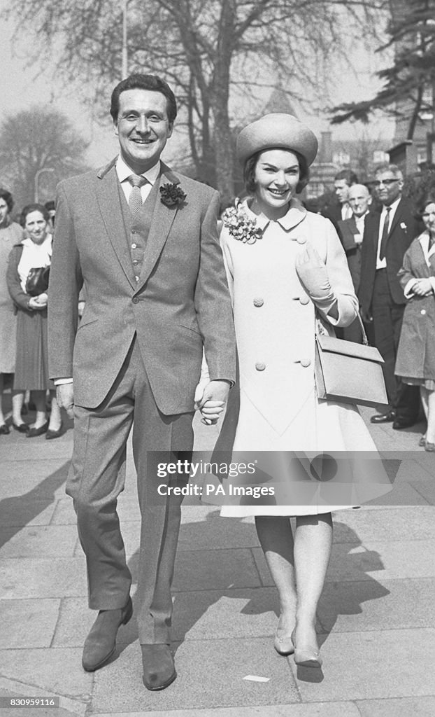 Patrick MacNee and his bride Catherine Woodville step into the... News