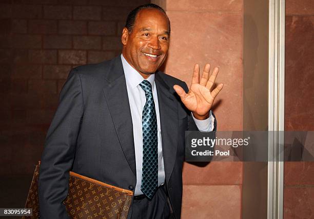 Simpson leaves court after closing arguments for his trial at the Clark County Regional Justice Center on October 2, 2008 in Las Vegas, Nevada....