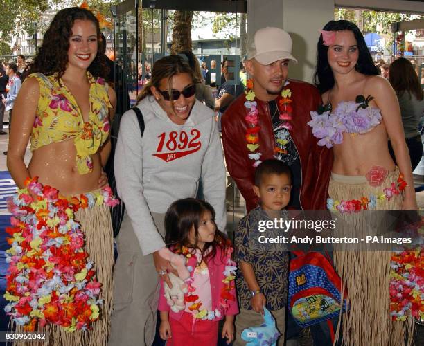 Former All Saints singer Mel Blatt, her husband Stuart Zender and their child Lilyella arrive for the UK premiere of Disney's new animation adventure...