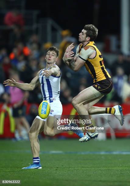 Ricky Henderson of the Hawks fails to hold the ball during the round 21 AFL match between the Hawthorn Hawks and the North Melbourne Kangaroos at...